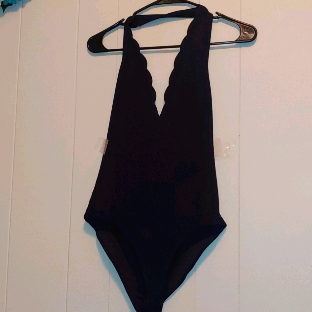 Haltered body suit